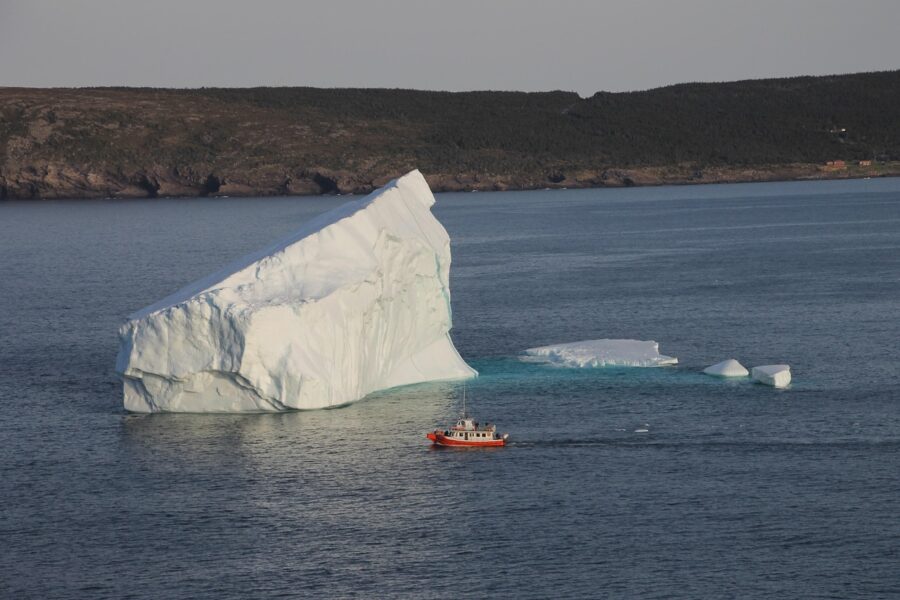 ice berg in the water off of Newfoundland st johns